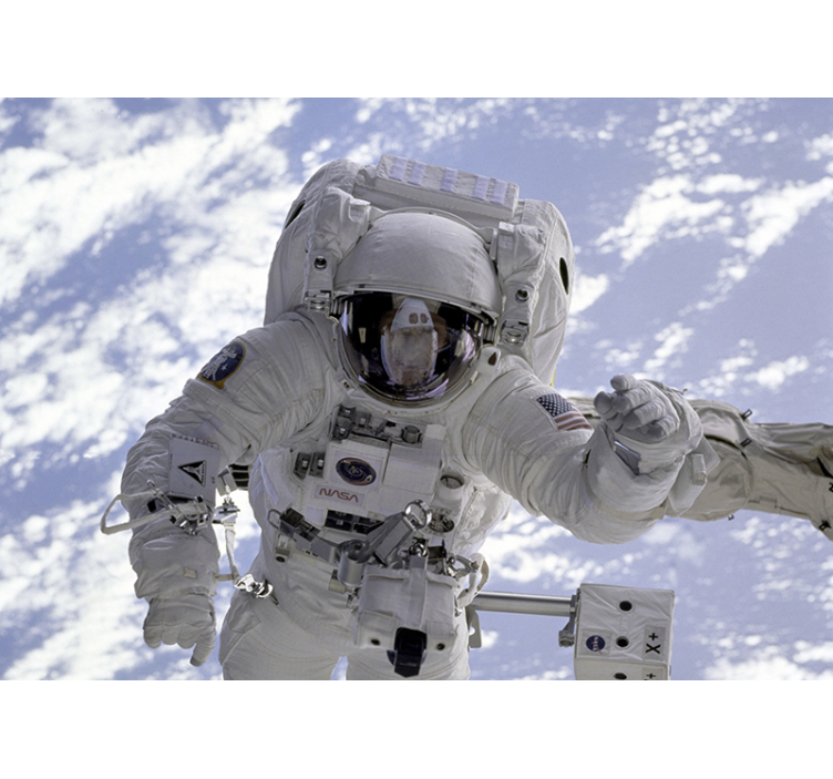 Space wall mural astronaut in orbit - TenStickers