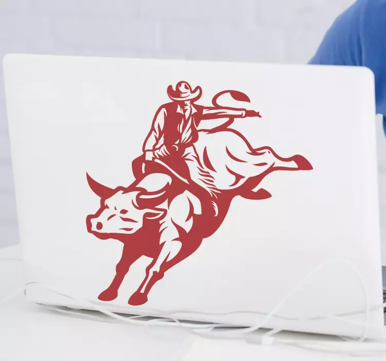 Cowboy riding a bull  laptop sticker - TenStickers
