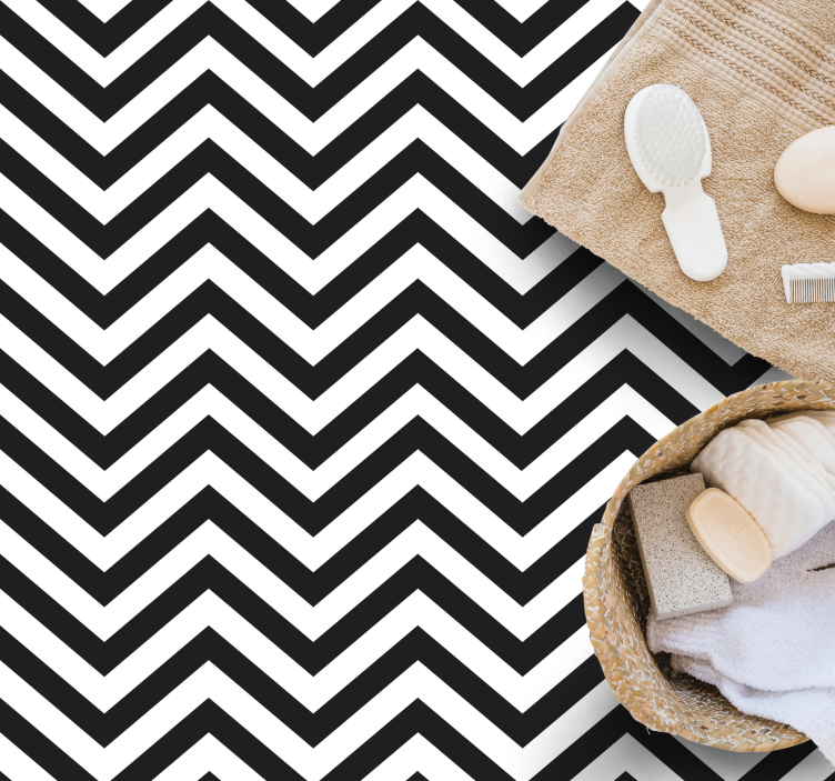 Striped vinyl rug in black and white chevron - TenStickers